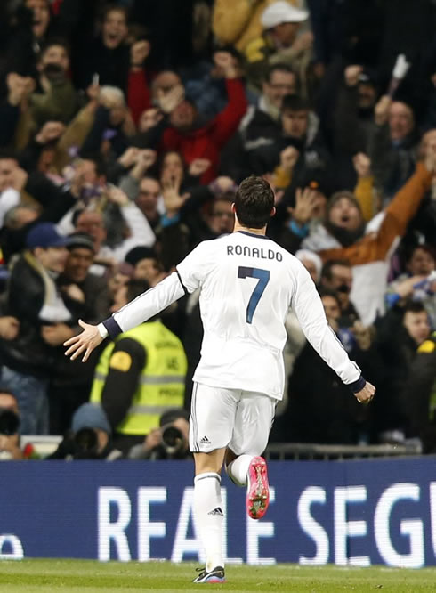 Cristiano Ronaldo running towards Real Madrid, as the Santiago Bernabéu fans go wild in the Madrid derby against Atletico