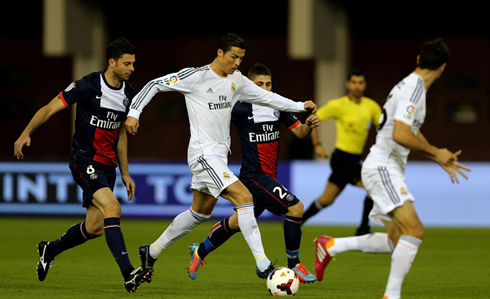 Cristiano Ronaldo carrying the ball during a friendly in Doha, Qatar, between Real Madrid and PSG
