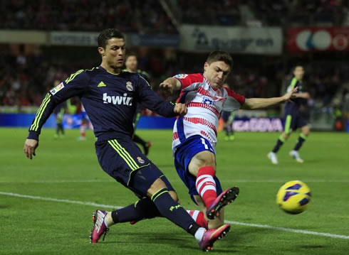 Cristiano Ronaldo suffering a rough tackle in Granada vs Real Madrid, in 2013