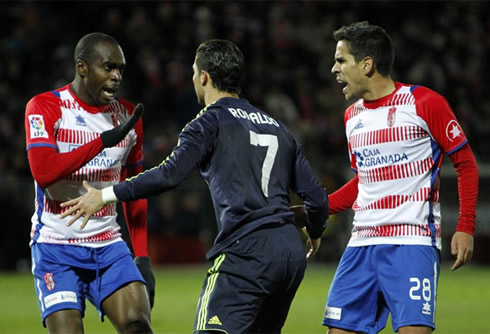 Cristiano Ronaldo about to pick a fight with a Granada player, who asks him to be calm, in La Liga 2013