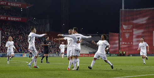 Cristiano Ronaldo holds steady as his Real Madrid teammates group with him on the pitch