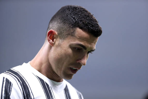 Cristiano Ronaldo looking down and thinking about the game