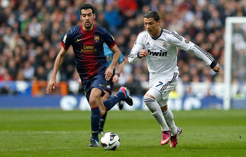 Cristiano Ronaldo outrunning Sergio Busquets, in Real Madrid 2-1 Barcelona, for La Liga 2012-2013