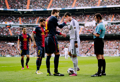 Gerard Piqué slapping Cristiano Ronaldo on the face, after a foul was called up on him, in Real Madrid vs Barcelona for La Liga 2012-2013