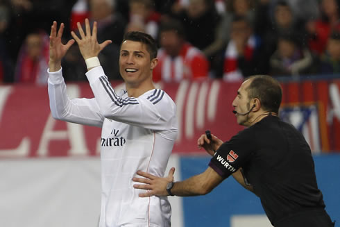 Cristiano Ronaldo being pushed by the referee