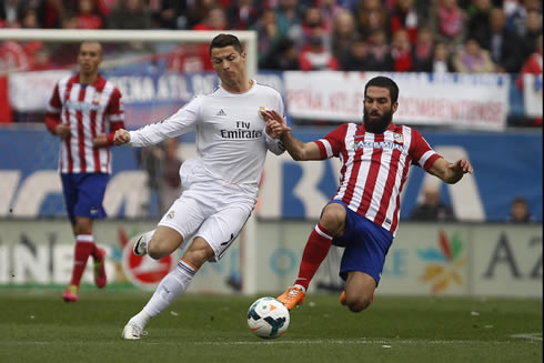 Cristiano Ronaldo getting tackled by Arda Turan