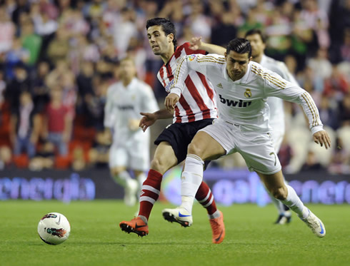 Cristiano Ronaldo being pushed by an Athletic Bilbao defender in 2012