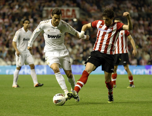 Cristiano Ronaldo getting past an Athletic Bilbao defender in 2012