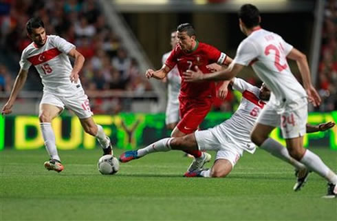 Cristiano Ronaldo running and dribbling several Turkish defenders, in a friendly game for Portugal before the EURO 2012 start