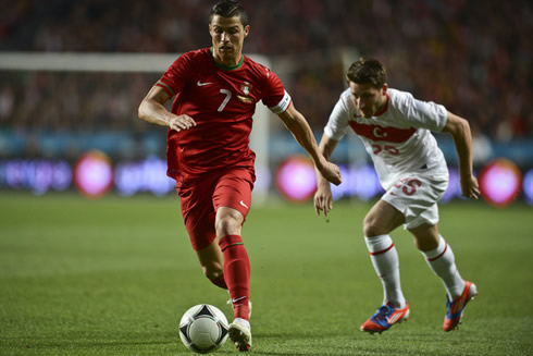 Cristiano Ronaldo running away with the ball in Portugal 1-3 Turkey, before the start of the EURO 2012