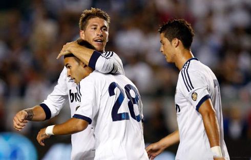 Sergio Ramos hugging Jesé, with Cristiano Ronaldo walking by them, in the LA Galaxy vs Real Madrid pre-season friendly