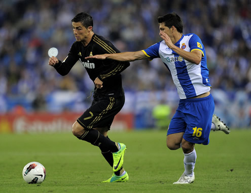 Cristiano Ronaldo trying to escape from a defender