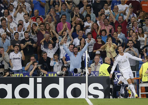 Cristiano Ronaldo running in circles at the Santiago Bernabéu, after scoring for Real Madrid in the UEFA Champions League