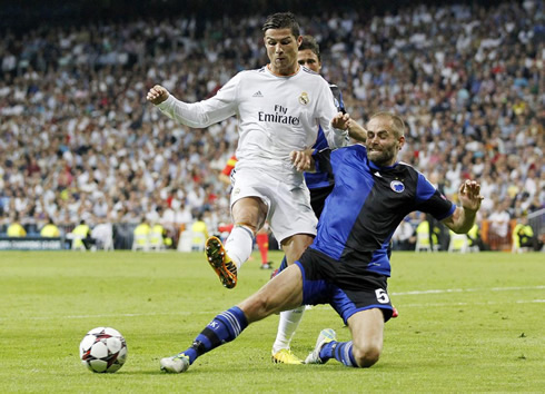 Cristiano Ronaldo trying to get past a defender in Real Madrid 4-0 Copenhagen, for the UCL 2013-2014