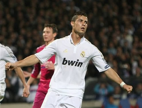 Cristiano Ronaldo celebrates a goal with Kallstrom behind him