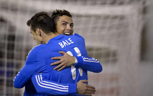 Cristiano Ronaldo friendly hug to Gareth Bale during a Real Madrid game