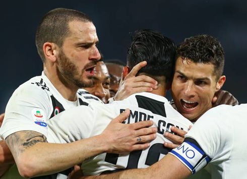 Bonucci, Emre Can and Cristiano Ronaldo celebrate Juventus goal