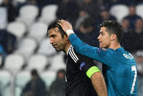 Cristiano Ronaldo comforting Buffon in Champions League clash between Juventus and Real Madrid in 2018