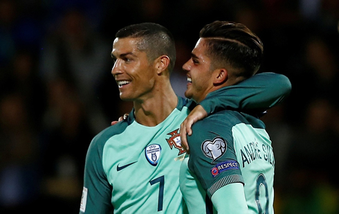Cristiano Ronaldo putting his arm around André Silva, after his goal against Hungary