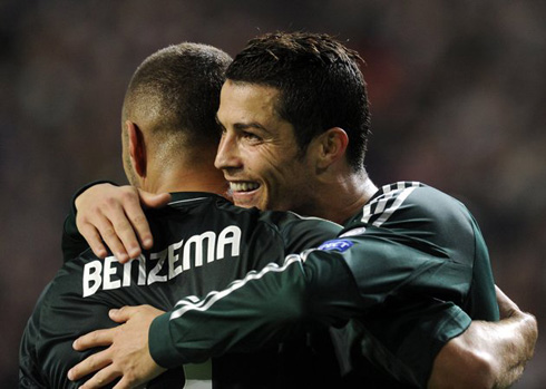 Cristiano Ronaldo hugging Karim Benzema, in Real Madrid 1-4 win against Ajax, for the UEFA Champions League 2012-2013
