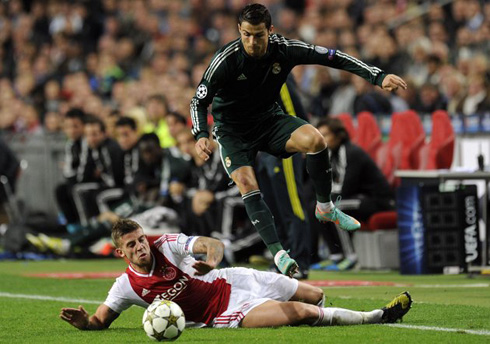 Cristiano Ronaldo jumping over a defender in Ajax 1-4 Real Madrid, in the UEFA Champions League 2012-2013