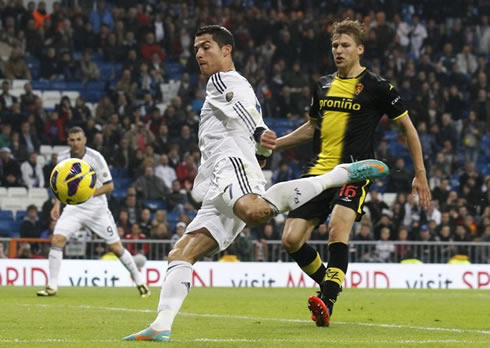 Cristiano Ronaldo preparing to strike the ball with his left foot, in Real Madrid 4-0 Zaragoza, for La Liga 2012-2013