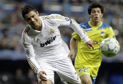 Cristiano Ronaldo smiling as he watches the ball getting away in the UEFA Champions League game against APOEL