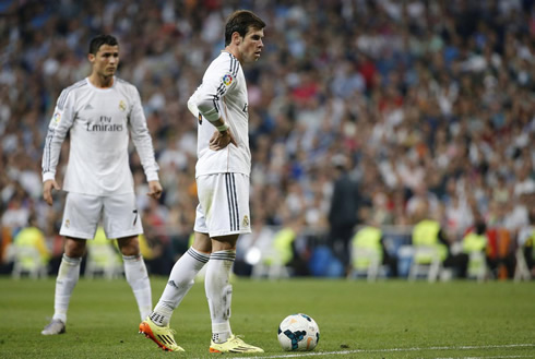 Cristiano Ronaldo ready to take a free-kick and standing near Gareth Bale
