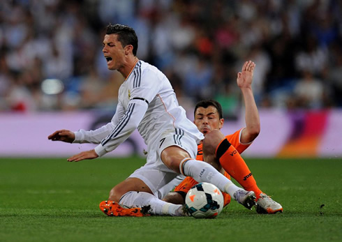 Cristiano Ronaldo being tackled and fouled in Valencia 2-2 Real Madrid