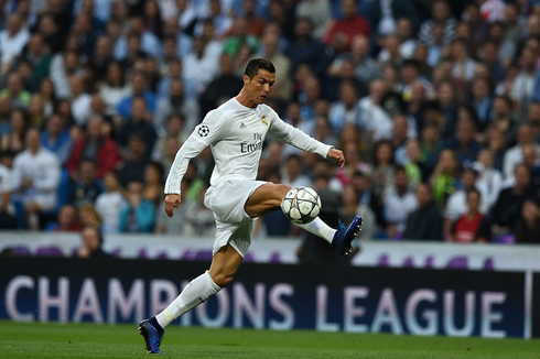 Cristiano Ronaldo controlling the ball in a Champions League semi-finals game