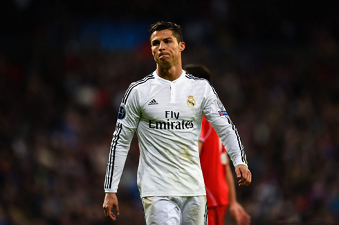 Cristiano Ronaldo with a closed expression, showing his discontentment during Real Madrid match against Liverpool