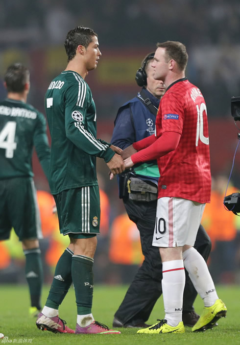 Cristiano Ronaldo greeting Wayne Rooney after the end of Manchester United 1-2 Real Madrid, at Old Trafford, in 2013