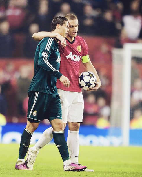 Cristiano Ronaldo going head against head with Vidic in a friendly manner, in Manchester United v Real Madrid, in 2013