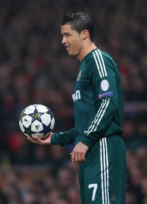 Cristiano Ronaldo holding a UEFA Champions League football, in Manchester United v Real Madrid, in 2013