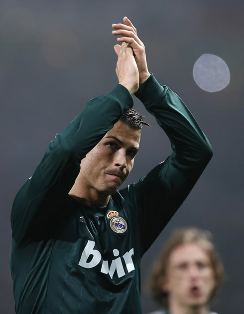 Cristiano Ronaldo applauding the Manchester United fans in the stands, at the Old Trafford game he made for Real Madrid, in 2013