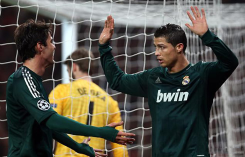 Cristiano Ronaldo and Kaká in Real Madrid goal celebrations during the match against Manchester United, for the Champions League 2nd leg, in 2013