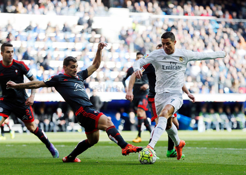 Cristiano Ronaldo attempts to reach out first to the ball