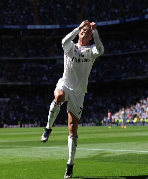 Cristiano Ronaldo jumping to celebrate his goal in Real Madrid vs Granada
