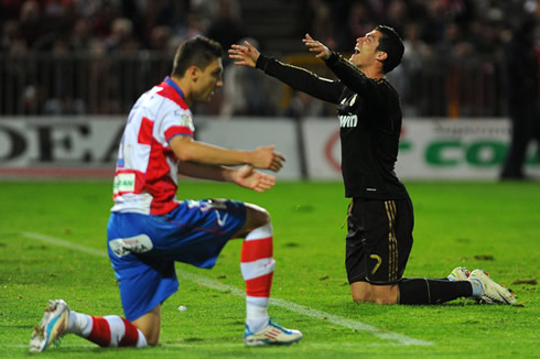 Cristiano Ronaldo gets on his knees and starts praying during a soccer/football match for Real Madrid in 2012