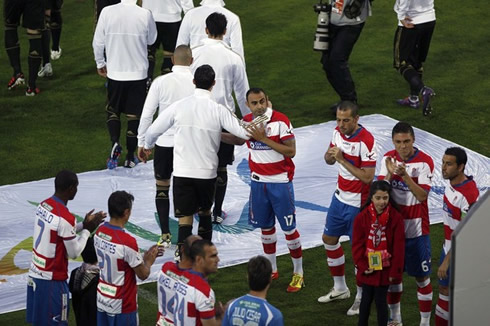 Cristiano Ronaldo saluting Carlos Martins during the Real Madrid pasillo made by Granada, in La Liga 2012