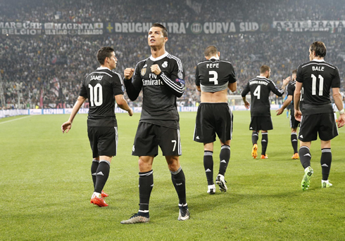 Cristiano Ronaldo turns to the Real Madrid fans and clenches his fists