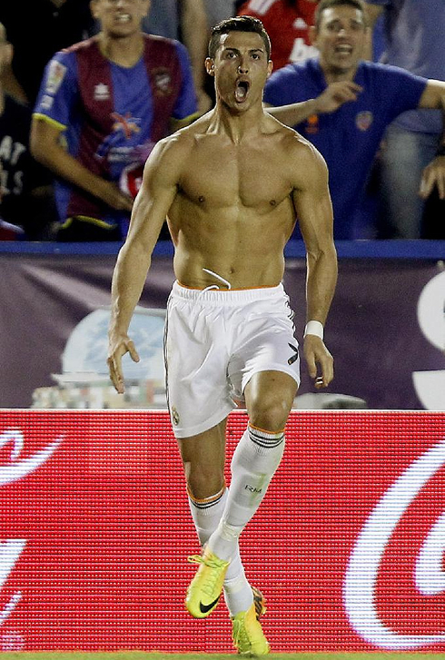 Cristiano Ronaldo half naked with his shirt off, celebrating Real Madrid winning goal against Levante, in La Liga 2013-2014