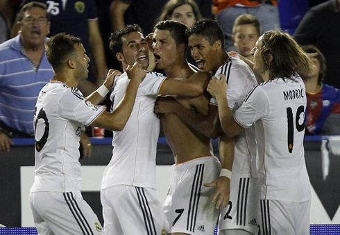 Cristiano Ronaldo and his Real Madrid teammates celebrating win from a last-minute goal against Levante