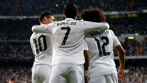 Cristiano Ronaldo hugging both James Rodríguez and Marcelo