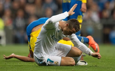 Cristiano Ronaldo tapping the floor in despair and frustration