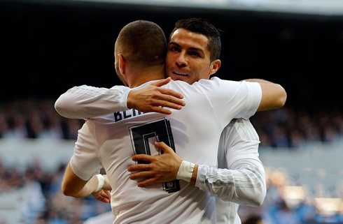 Cristiano Ronaldo hugs Karim Benzema after a tough week