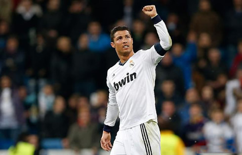 Cristiano Ronaldo raising his left hand, as a sign of strength, in 2013