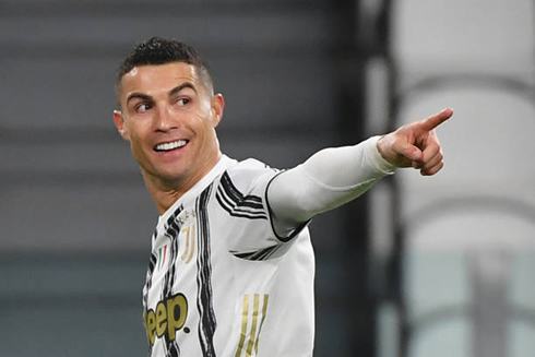 Cristiano Ronaldo points his finger to a teammate, after scoring for Juventus
