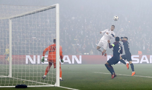 Cristiano Ronaldo rises in the air to score Real Madrid's first goal against PSG in March of 2018
