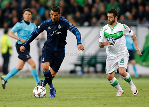 Cristiano Ronaldo getting past Vieirinha in Wolfsburg 2-0 Real Madrid, for the UEFA Champions League quarter-finals first leg